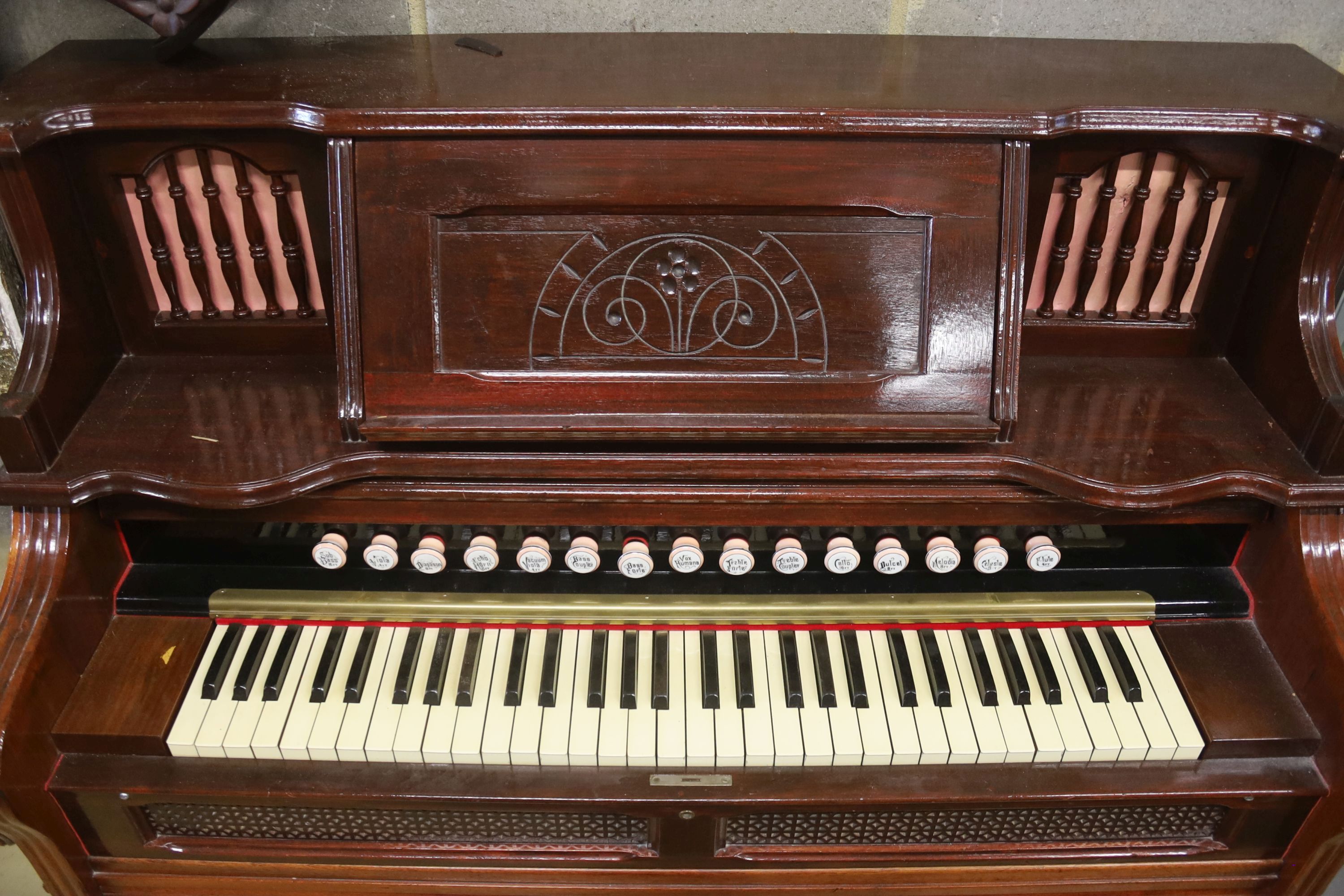 A late Victorian mahogany harmonium, width 120cm, depth 60cm, height 130cm